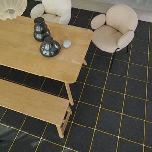 Illustration - Ihr Experte für schönes Wohnen - Filzteppich im Esszimmer.